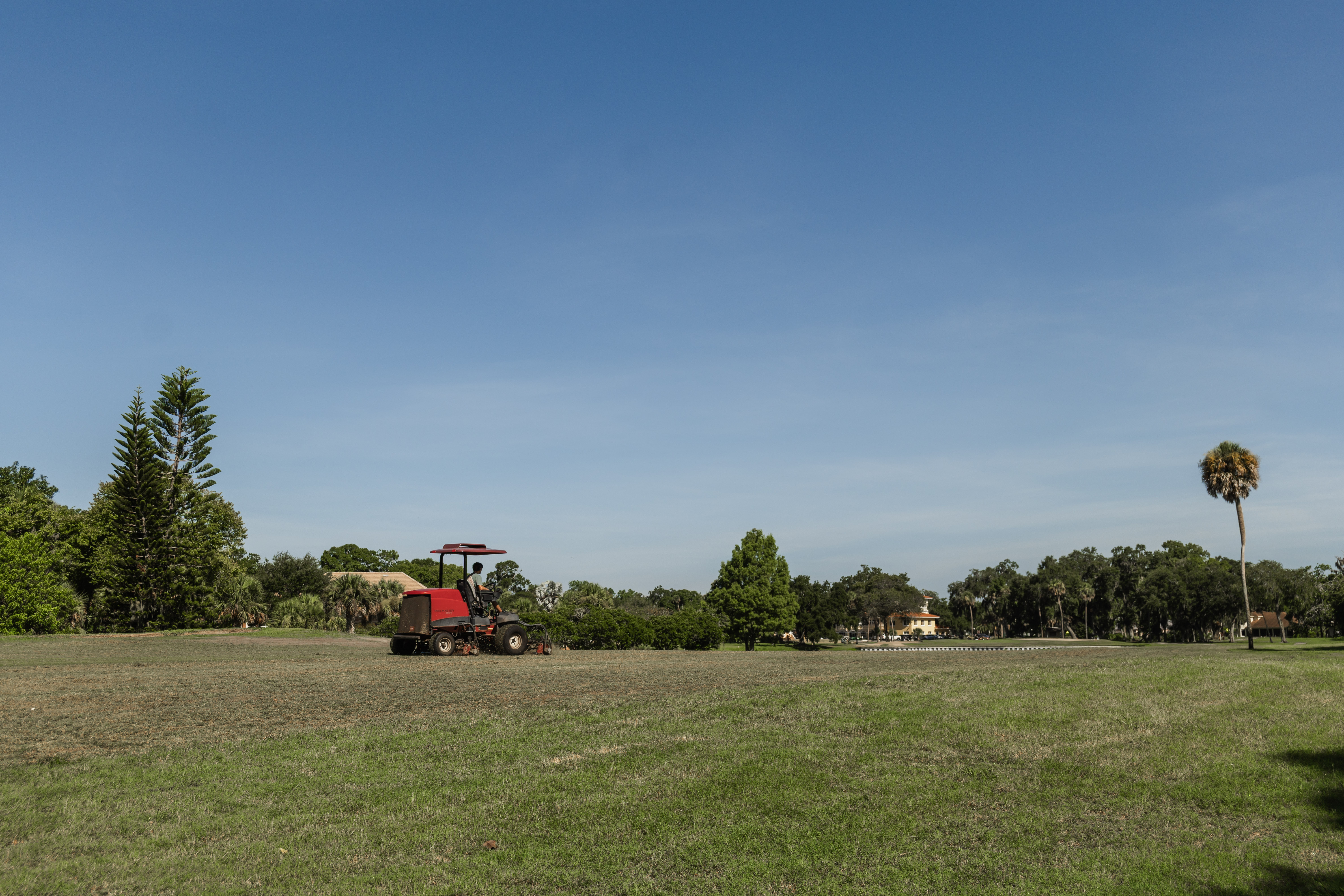 lawn mower, giving maintenance to the green